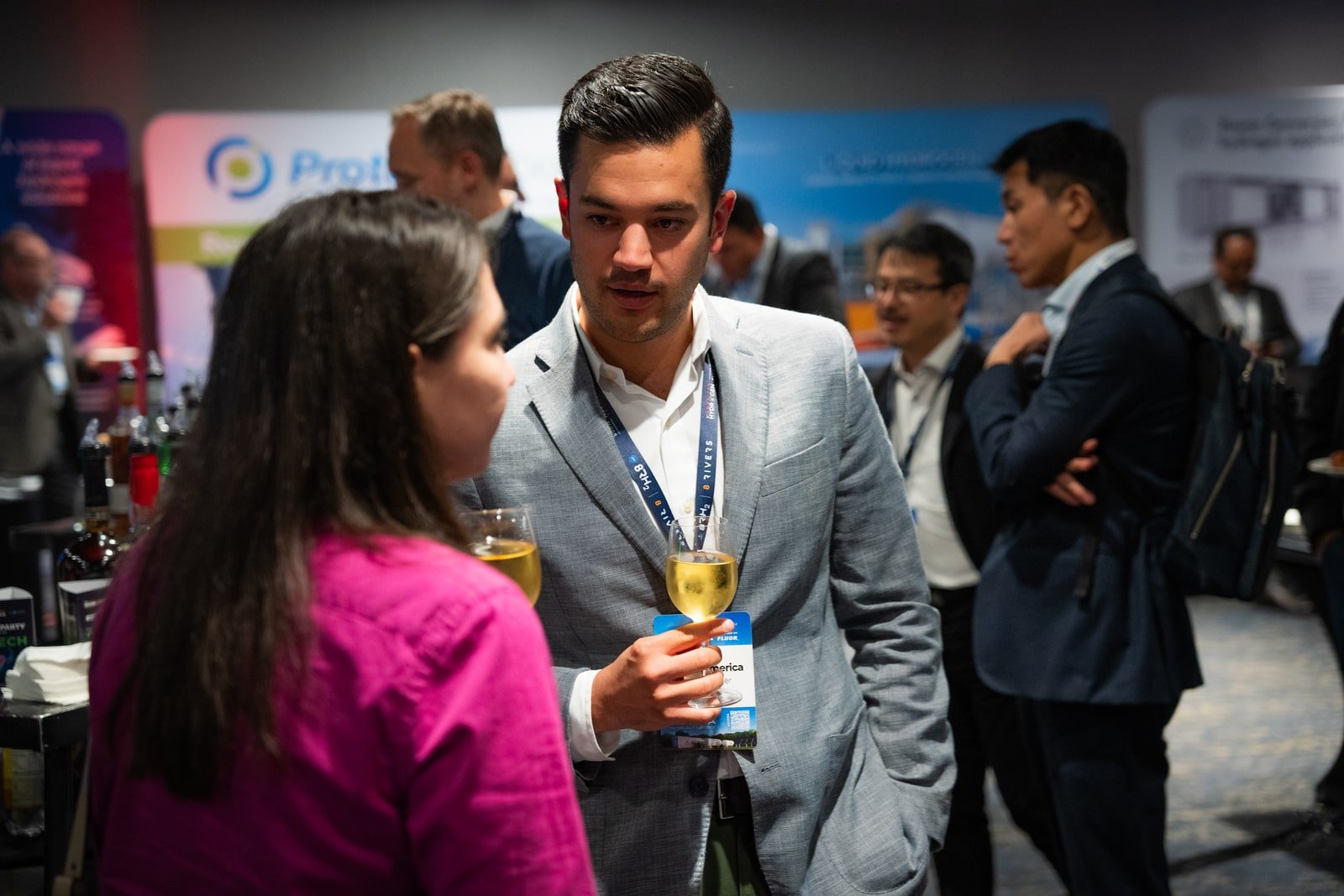 Participants of the forum networking at cocktail party at american hydrogen forum