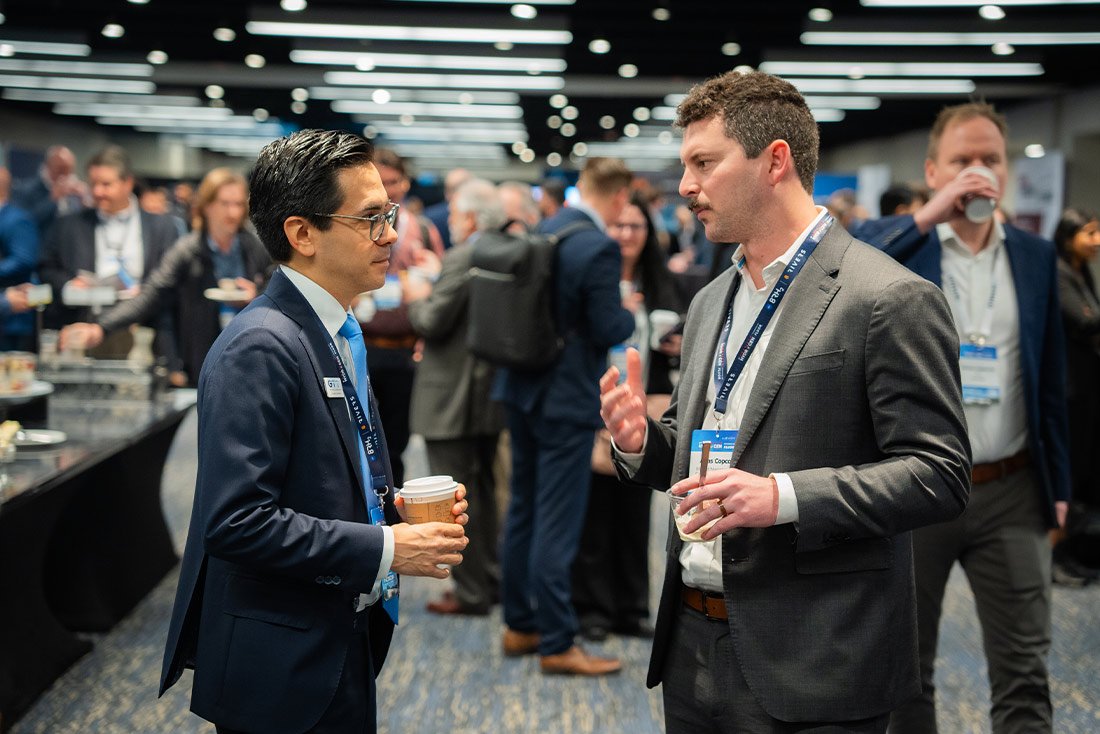 Forum participants networking during coffee break at the american hydrogen forum